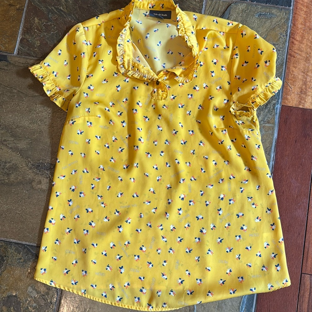 Cute yellow blouse from ModCloth. Great condition.
